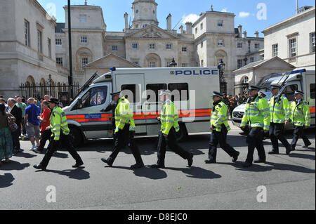 Whitehall, London, UK. 27th May 2013. A heavy police prescence on Whitehall outside Horseguards as the EDL march takes place. The EDL demonstration prompted by the death of Drummer Lee Rigby and a counter demonstration cause chaos on Whitehall as they move towards Downing Street.