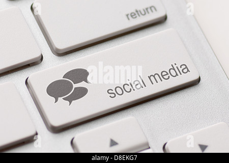 Social Media button on a keyboard with speech bubbles. Stock Photo
