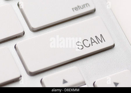 Scam Computer Keys Showing Swindles And Fraud Stock Photo