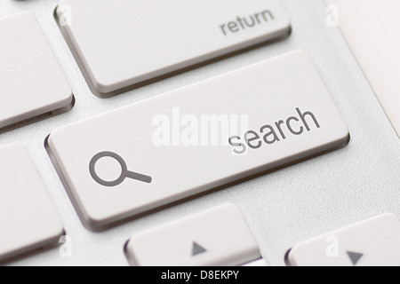 search enter button key on white keyboard Stock Photo