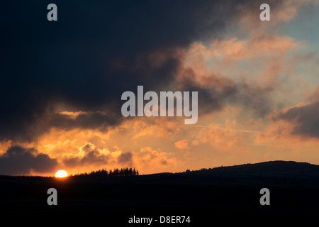 Dramatic stormy sunrise over Dartmoor, Devon, England Stock Photo