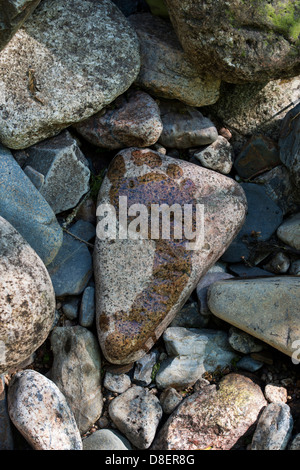 Wet footprint on a stone by a river. UK Stock Photo