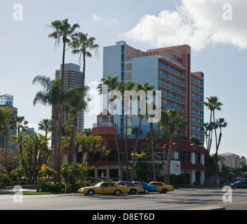 Downtown San Diego with yellow cabs parked near a hotel Stock Photo