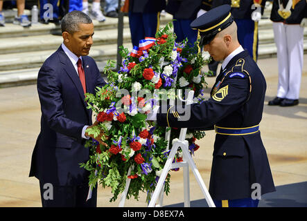 US President Barack Obama lays a wreath during the Memorial Day ceremony at the Tomb of the Unknown Soldier May 27, 2013 at Arlington National Cemetery, VA. Stock Photo