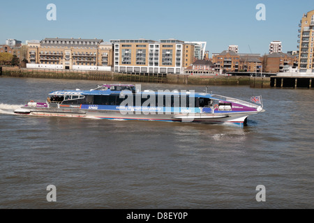 'Tornado Clipper' No 9 of 'Thames Clippers', sponsored by KPMG, ailing on the River Thames, London, UK. Stock Photo