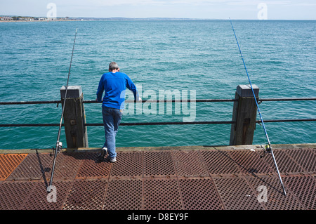 26/05/2013 Enjoying sea fishing on a bright green sea, Worthing Pier on a sunny Sunday. Worthing. Picture by Julie Edwards Stock Photo