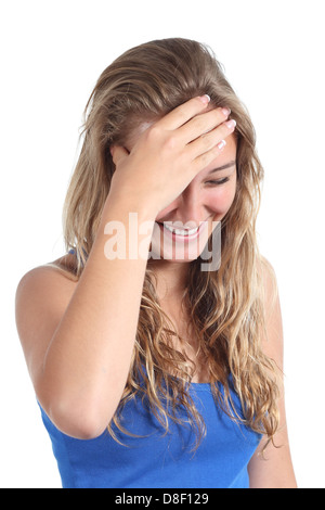 Happy teenager girl laughing with a hand in forehead isolated on a white background Stock Photo