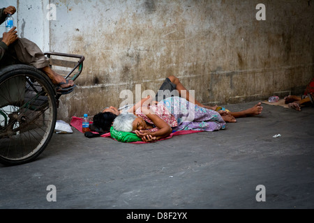 Homeless People sleeping in the Street in Phnom Penh, Cambodia Stock Photo
