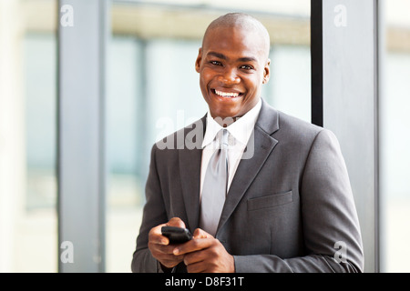 handsome african american businessman using a smart phone Stock Photo