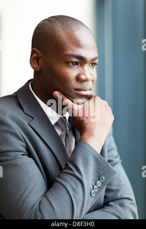 thoughtful african american businessman in office Stock Photo
