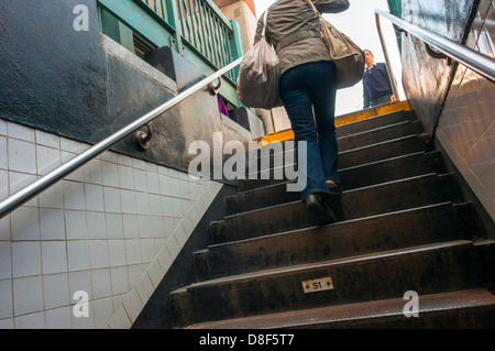 New York, NY 27 May 2013 Straphangers use the subways steps in the Soho neighborhood of New York, Stock Photo