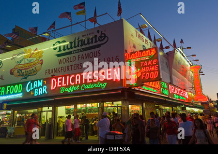 Coney Island, NY - Nathan's Famous Hot Dog restaurant at dusk Stock Photo