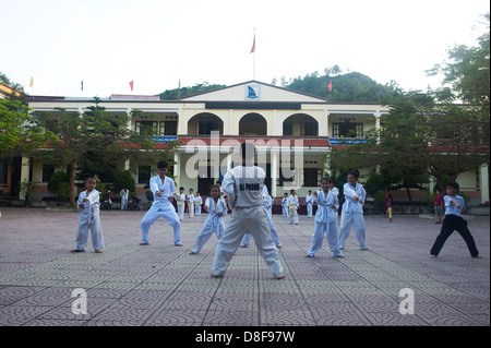 Cat Ba Island, Halong Bay, North Vietnam - Young boys training martial arts Stock Photo