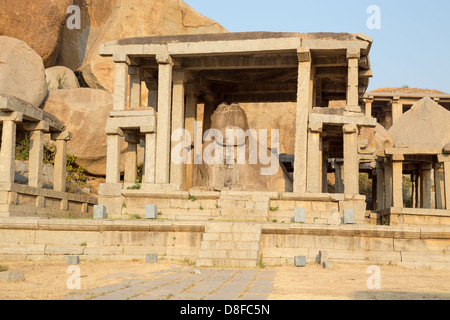 Monolithic Nandi staue and shrine, Hampi, India Stock Photo