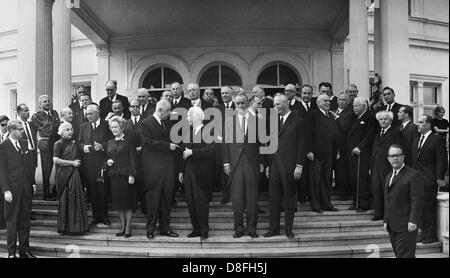 Group picture of the guests of former chancellor Konrad Adenauer's funeral on the 25th of April in 1967. The picture shows (l-r, m) chancellor Kurt Georg Kiesinger, US president Lyndon B. Johnson, German president Heinrich Lübke and French state president Charles de Gaulle. former Israel minister president David Ben Gurion (4th of right), left of De Gaulle Mrs. Wilhelmine Lübke and British prime minister Harold Wilson. Stock Photo