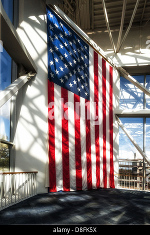 The large American flag in the meeting hall at The National Naval Aviation Museum Stock Photo