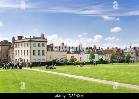 View of the green and houses outside the Cathedral in Wells, Somerset, England, UK Stock Photo