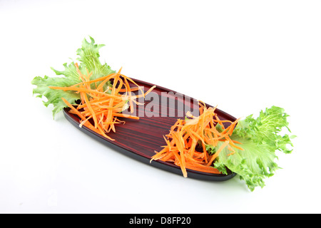 Sushi dish and vegetables on the side,Sushi is a food of Japanese. Stock Photo