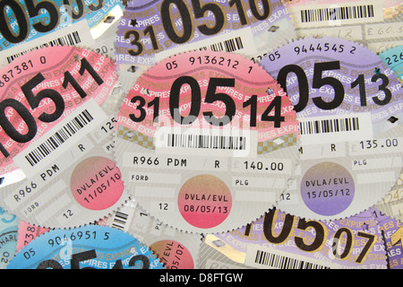 Several years worth of UK tax discs (UK car). Stock Photo