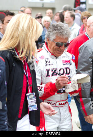 Indianapolis, USA. 26th May 2013. Mario Andretti takes time for a fan prior to the Indianapolis 500 at the Indianapolis Motor Speedway in Speedway, IN. Credit:  Cal Sport Media / Alamy Live News Stock Photo