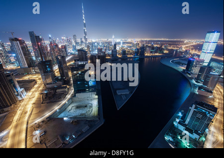 View of Business Bay and Burj Khalifa at night, Downtown Dubai, UAE