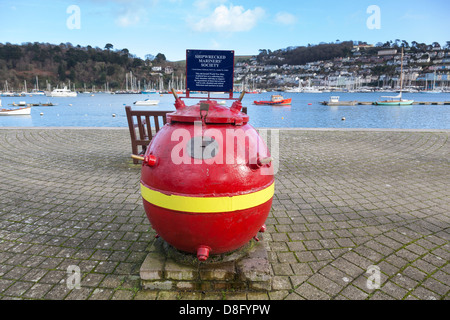 Disused mine converted to a charity collection vessel for the Shipwrecked Mariner's Society on the harbourside in Dartmouth. Stock Photo