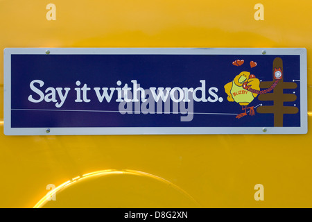 'Say it with Words' slogan the side of a Vintage ford pick up Stock Photo