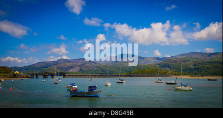 boats with Barmouth Bridge at the background Stock Photo