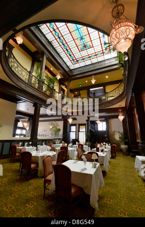 Palm Court dining room in the historic Geiser Grand Hotel in Baker City, Oregon. Stock Photo