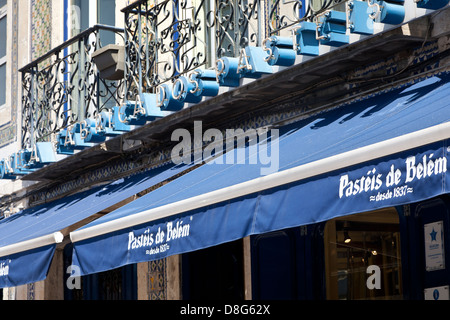 The famous 'Pasteis de Belem' patisserie shop in Belem, Lisbon, Portugal. Baking the famous 'Pastel de Nata' custard tarts. Stock Photo