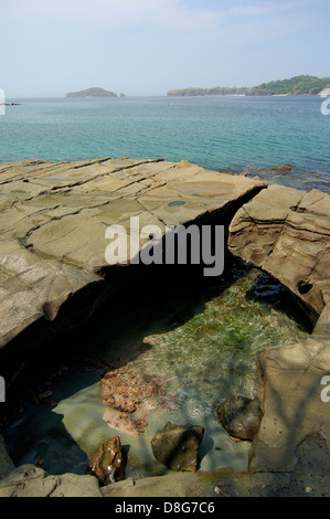 Flat rocks in Contadora island shore Stock Photo