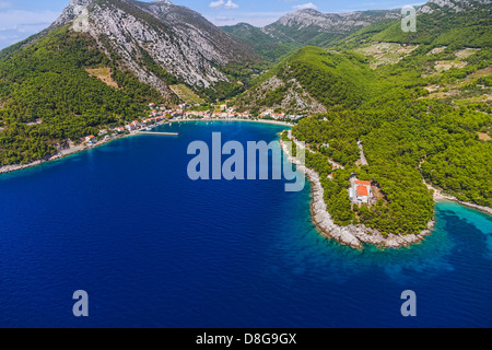 Aerial helicopter photo of small fishing village Trstenik on Peljesac peninsula, Croatia Stock Photo