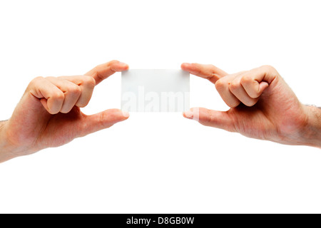 Blank business card in the hands of a businessman. isolated on white Stock Photo