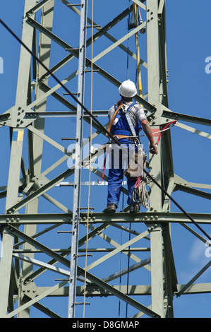 high voltage electrician, overhead lineman Stock Photo