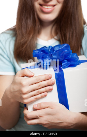 Woman hand holding gift or present box Stock Photo