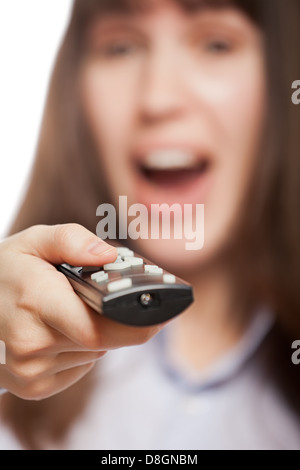 Woman hand holding tv channel remote control Stock Photo