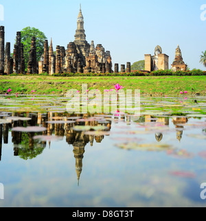 Wat Traphang Thong with reflection in the pond. Sukhothai Stock Photo