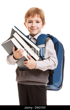 Schoolboy with backpack holding books Stock Photo