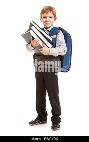 Schoolboy with backpack holding books Stock Photo