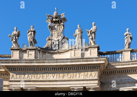 Statues on top of Bernini's colonnades, St. Peters Square, Vatican City, Rome, Italy Stock Photo