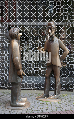 Tuennes and Schael are two figures from the puppet theater of Cologne. Memorial by Wolfgang Reuter, Cologne, Germany Stock Photo