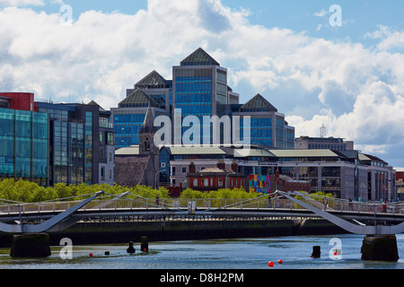 Dublin city skyline showing the Immaculate Heart of Mary church overshadowed by the Ulster bank group HQ on Georges quay Stock Photo