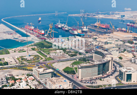 Aerial of Dubai in UAE of thriving dry docks shipping port off of downtown in United Arab Emirates in Middle East Stock Photo