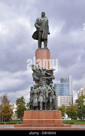 Statue of the Russian revolutionary Vladimir Ilyich Lenin in October Square, Moscow, pictured against a suitably dramatic sky. Stock Photo