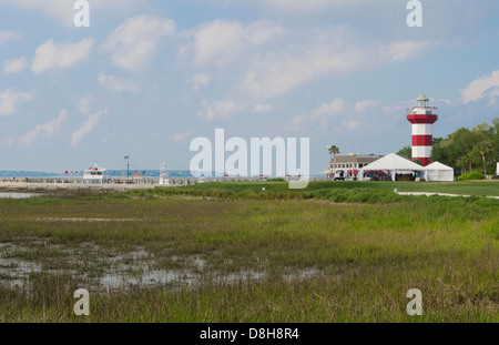 Scenic of 18th Hole at exclusive Habour Town Golf Links in Hilton Head South Carolina with famous red and white lighthouse Stock Photo