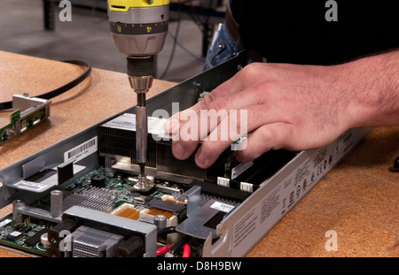 Close up of technician assembling server for computer IT company for ...