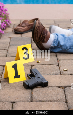 Evidence Markers at Handgun Murder Crime Scene Stock Photo