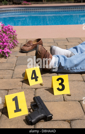 Shell casings and crime scene marker with number three isolated on ...