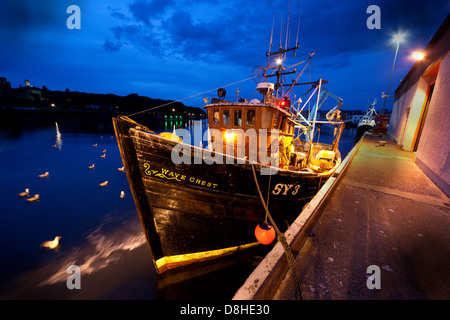 Wave Crest Trawler docked at Stornoway Fishing Port & Harbour at dusk Stock Photo