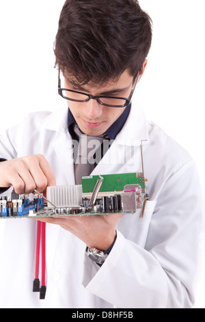 Computer engineer working on an old motherboard Stock Photo